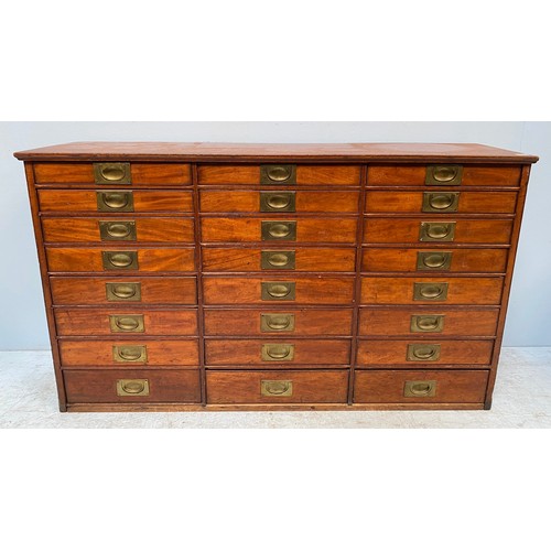 638 - A 19th Century walnut collector’s chest of drawers, comprising three banks of eight graduated drawer... 