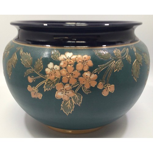 63 - A Langley Ware Pottery Jardinière, c1896-1930, carved, incised, gilded and painted with olive green ... 