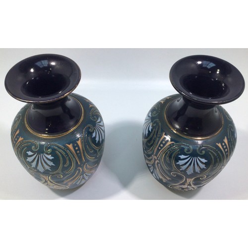 96 - A garniture of three Lovatt & Lovatt period Langley Ware Art Pottery vases, of ovoid form with flare... 