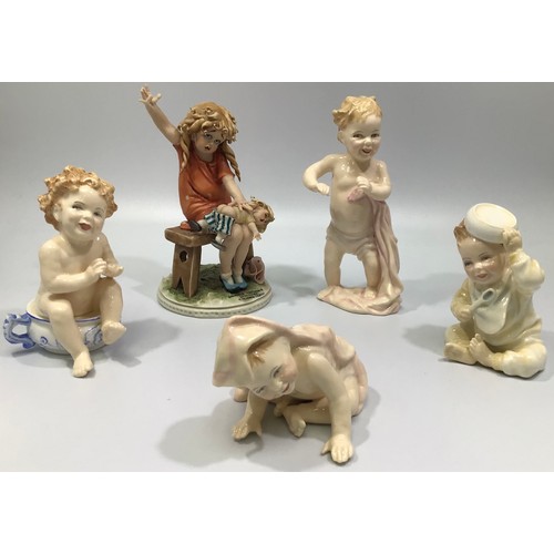 27 - Four Royal Doulton miniature figurines, comprising ‘First Steps’, HN3361, ‘Well Done’, HN3362, ‘Peek... 