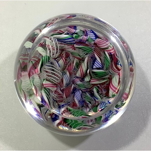 31 - A Baccarat crystal paperweight, of domed form, with Macedoine or Scramble design, with multicoloured... 