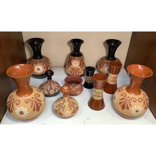 126 - Eleven pieces of Lovatt & Lovatt period 'stencilled' ware, including black and brown glazed vase gar... 