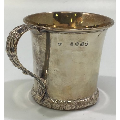 190 - A George III silver christening mug, of flared cylindrical form with acanthus-leaf cast and applied ... 