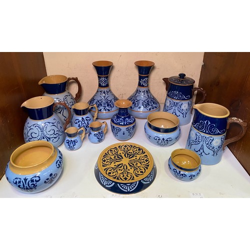 130 - A quantity of light and dark blue Lovatt & Lovatt period 'Lovique' ware including a pair of vases, v... 