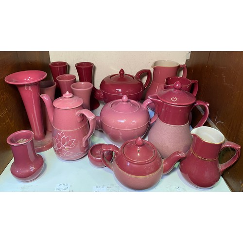 134 - A quantity of Lovatts Langley Ware 'Pink' glazed pottery including three various teapots, coffee pot... 