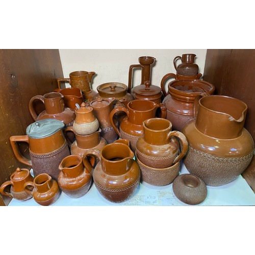 135 - A good quantity of 19th century Original Langley Ware or 'Chocolate Ware' pottery including jugs, to... 