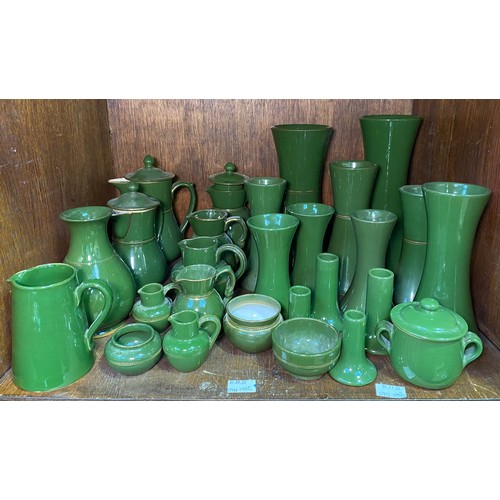 149 - A Quantity of Langley 'Green' Ware, including numerous graduated flower vases and jugs etc, (In Sect... 