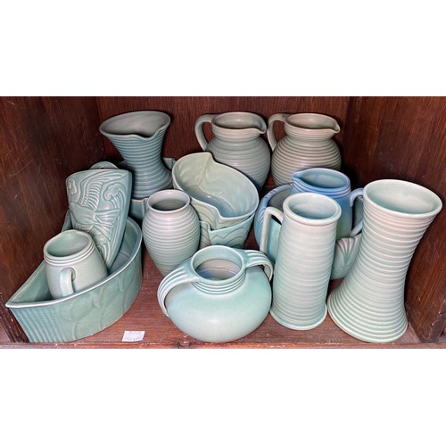 156 - Three various Langley Dendy ribbed pottery jugs, various bowls, vases and a wall pocket in the 'Wind... 