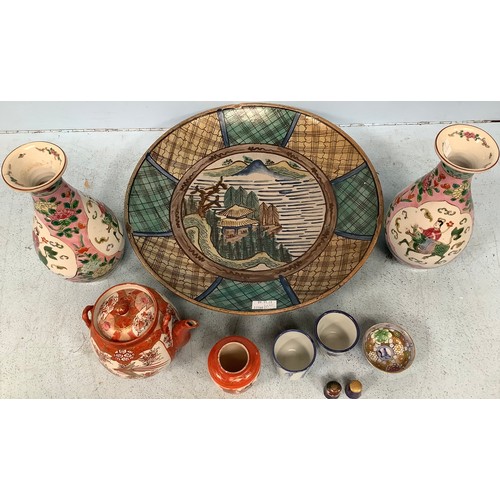 40 - A small collection of assorted Oriental ceramics including a charger, a pair of famille rose vases a... 