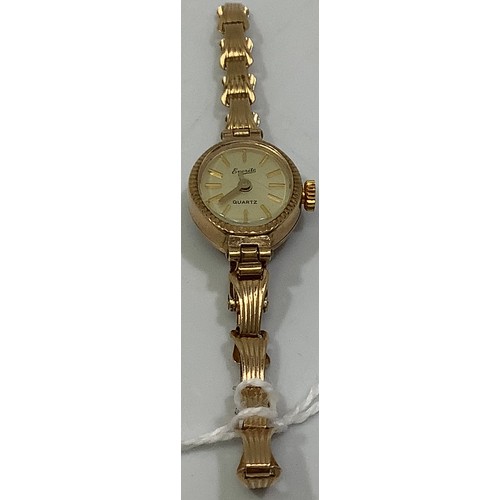 237 - A ladies 9ct gold Everite quartz wristwatch, the silvered dial with batons denoting hours, on 9ct go... 