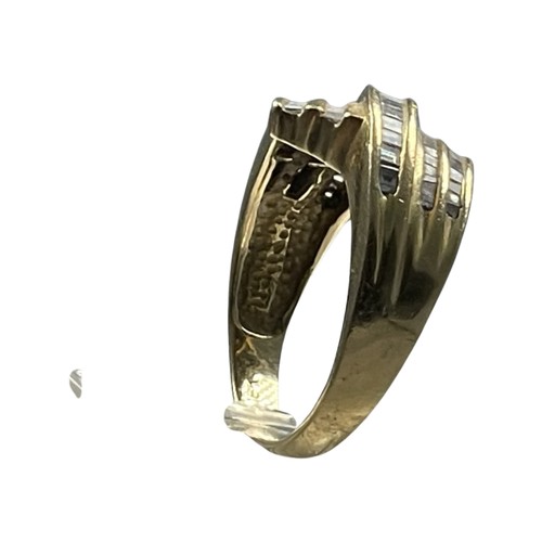 260 - An 18ct yellow gold dress ring, channel set with baguette diamonds over five rows, total weight of d... 