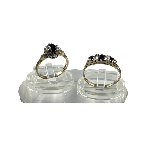 277 - A 9ct gold cluster ring set with a dark blue sapphire, with 12 small round diamonds, together with a... 