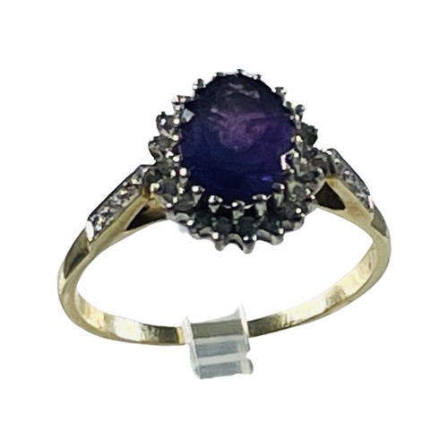 276 - A 9ct yellow gold amethyst and diamond cluster ring, with an oval amethyst to the centre, surrounded... 