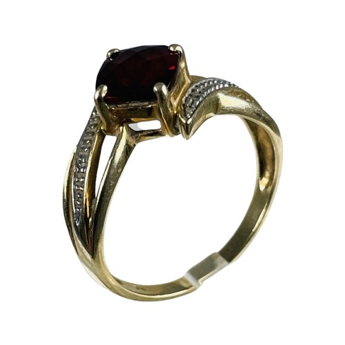 273 - A 9ct yellow gold dress ring, claw set with a square faceted garnet to the centre, ring weighs 3.2 g... 