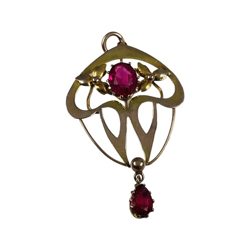 265 - A 9ct gold pendant, set with a red faceted stone to the centre, and another red faceted stone in a c... 