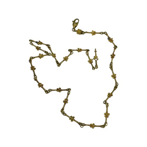 282 - An Italian 18ct yellow gold necklace, with a twist bar and daisy link, weight 13.6 grams.