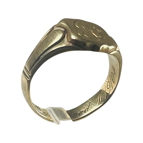 303 - An 18ct yellow gold signet ring with engraved monogram to the top, weighs 7.0 grams, finger size Q.