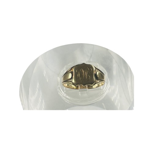 303 - An 18ct yellow gold signet ring with engraved monogram to the top, weighs 7.0 grams, finger size Q.