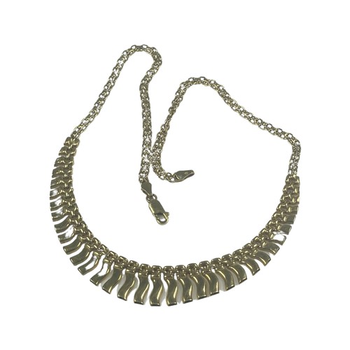 304 - A 9ct yellow gold flat fringe link necklace, 16.5’’, weighing 10.7 grams.