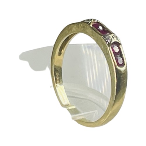 308 - An 18ct yellow gold ring, channel set with six round rubies, and four small round diamonds, ring wei... 