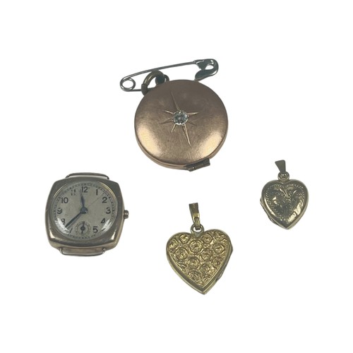 299 - A 9ct gold cased watch, (not working), with three various rolled gold lockets.