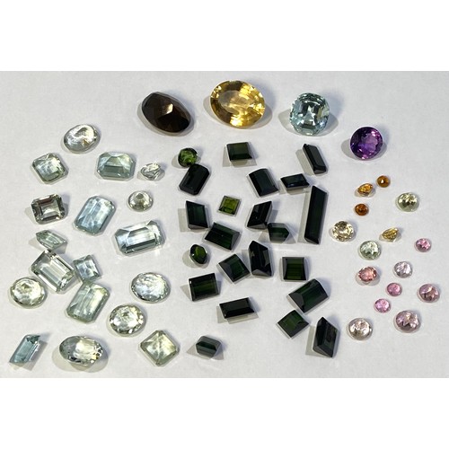 296 - Various loose semi precious stones including green Tourmaline in a variety of cuts, the largest meas... 