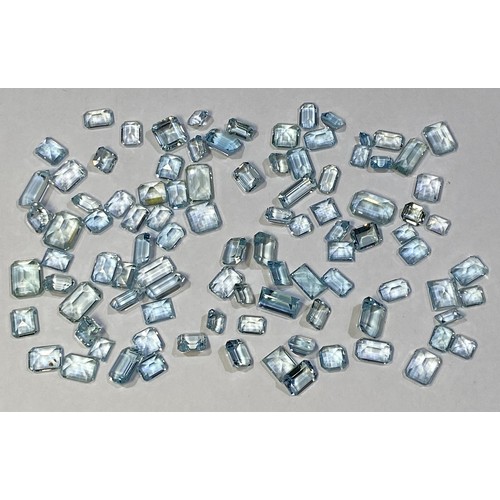 297 - A large quantity of Aquamarines in a variety of cuts and sizes, the largest measuring 12 x 8mm, 4 ca... 