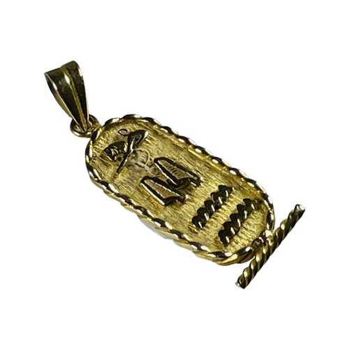 352 - An 18ct yellow gold Egyptian double sided cartouche pendant, with rope design edge, weighs 4.4 grams... 