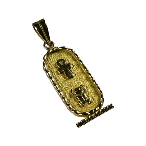 352 - An 18ct yellow gold Egyptian double sided cartouche pendant, with rope design edge, weighs 4.4 grams... 