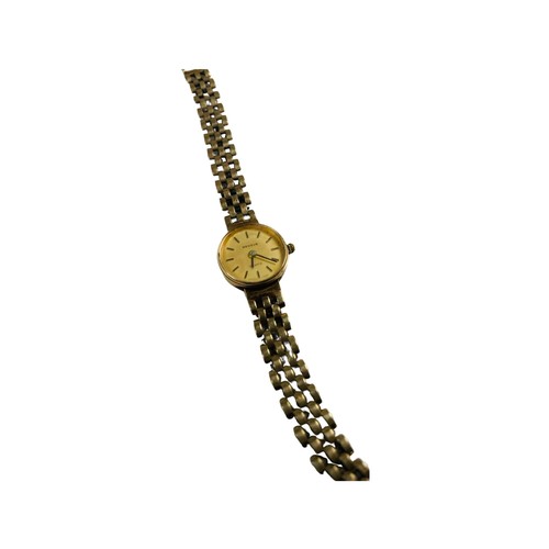 327 - A 9ct gold lady’s Geneve cocktail watch with 9ct gold bracelet, weighing 14.9 grams gross.