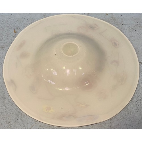 35 - A large white opaque glass charger, decorated with multicoloured flowers, 47cm diameter