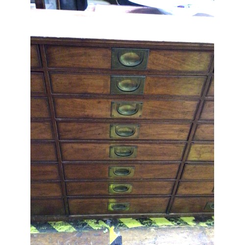 638 - A 19th Century walnut collector’s chest of drawers, comprising three banks of eight graduated drawer... 