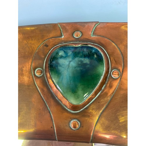 615 - A Liberty & Co Arts & Crafts oval mirror with hammered copper frame, inset with heart shaped pottery... 