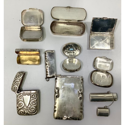 122 - A small collection of assorted silver items comprising a vesta case by Charles Boyton, with foliate ... 