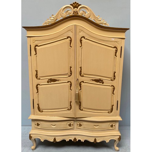 605 - A modern cream and gold painted French style two door armoire and a small linen press, converted to ... 