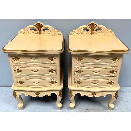 606 - A modern cream and gold painted French style chest of five short drawers, a dressing table with cane... 