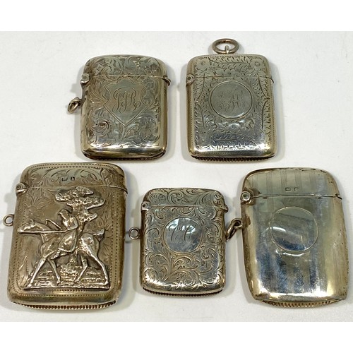135 - Five various silver vesta cases including an example with applied figure of a lady holding a crop  o... 