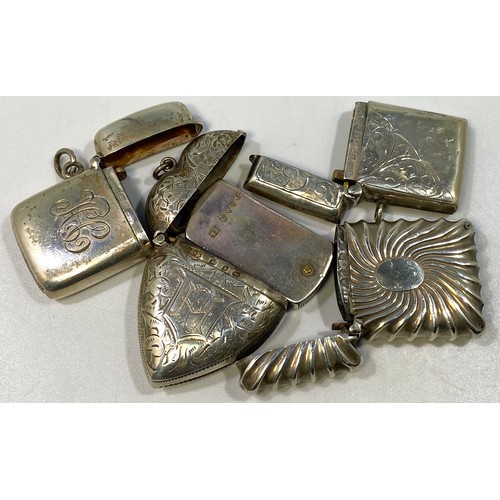 137 - Five various silver vesta cases including a Victorian example with swirled design, Birmingham 1889, ... 