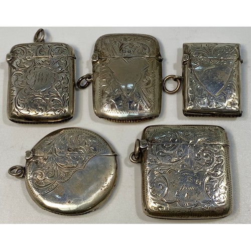 139 - Five various silver vesta cases including a circular example with half the body engraved with flower... 