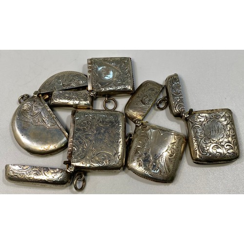 139 - Five various silver vesta cases including a circular example with half the body engraved with flower... 