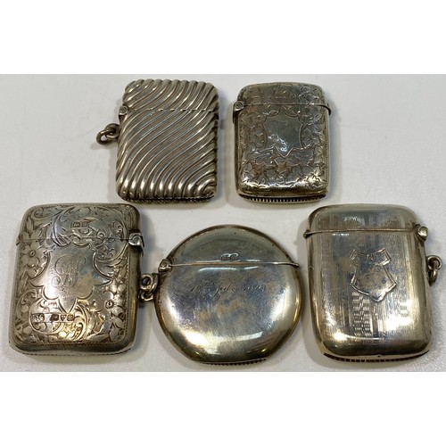 140 - Five various silver vesta cases including an example with floral and foliate decoration and engraved... 
