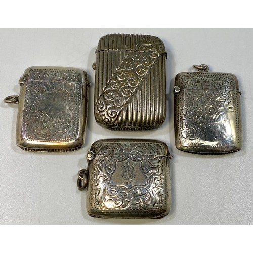142 - Three various large silver vesta cases including an example with star style engraving, Chester, 1913... 