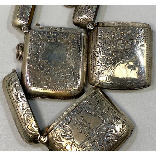 142 - Three various large silver vesta cases including an example with star style engraving, Chester, 1913... 