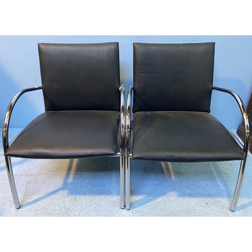 607 - A pair of mid-late 20th century Scandinavian Kebe style black leather chairs with curved tubular chr... 