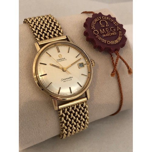 174 - A gents 9ct gold cased Omega Seamaster De Ville automatic wristwatch, the silvered dial with applied... 