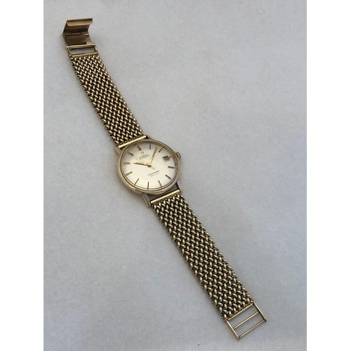 174 - A gents 9ct gold cased Omega Seamaster De Ville automatic wristwatch, the silvered dial with applied... 
