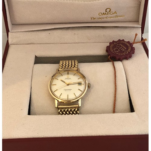 174 - A gents 9ct gold cased Omega Seamaster De Ville automatic wristwatch, the silvered dial with applied... 