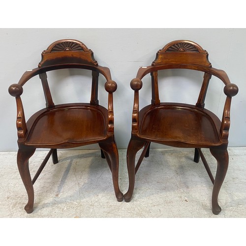 615 - A pair of large Victorian carver chairs with lunette carved crest rails, shaped arm rests with ball ... 