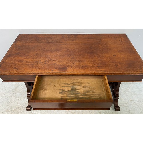 617 - A Victorian mahogany side / hall table raised on shaped trestle supports to a central turned stretch... 