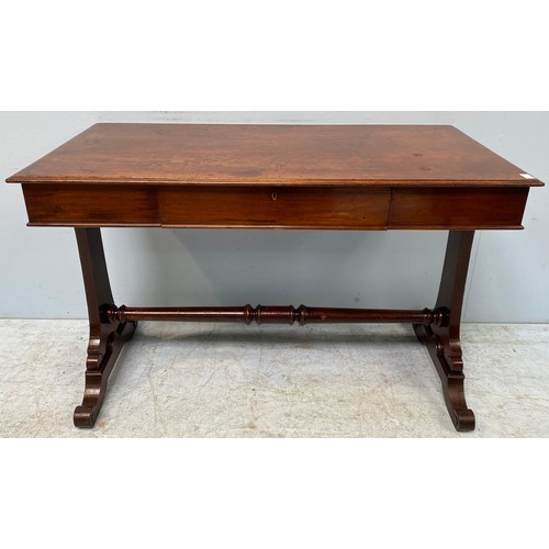 617 - A Victorian mahogany side / hall table raised on shaped trestle supports to a central turned stretch... 